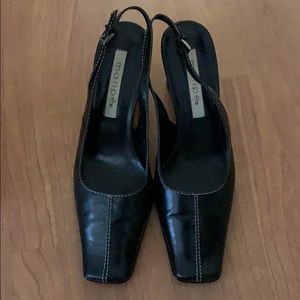Black leather casual heels.